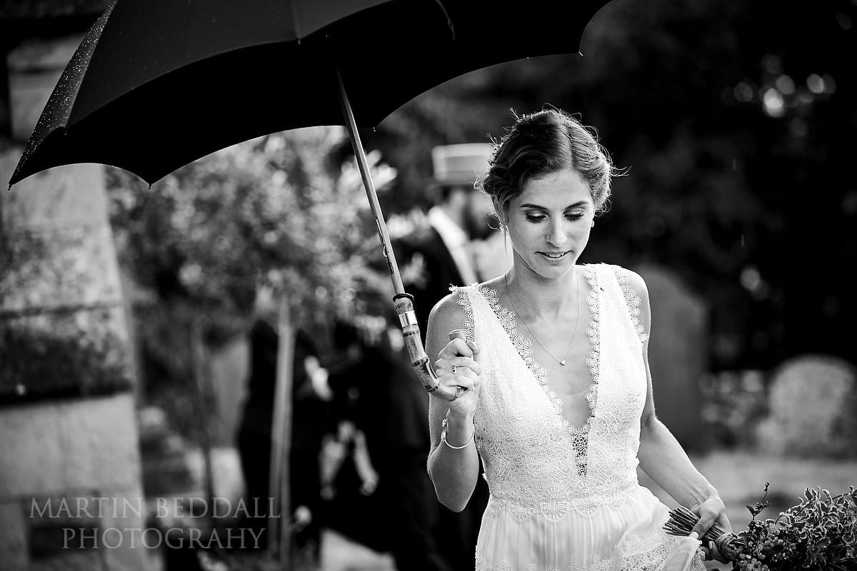 Bride and umbrella