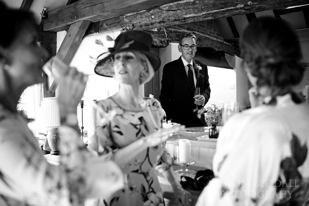 Father of the bride watches on