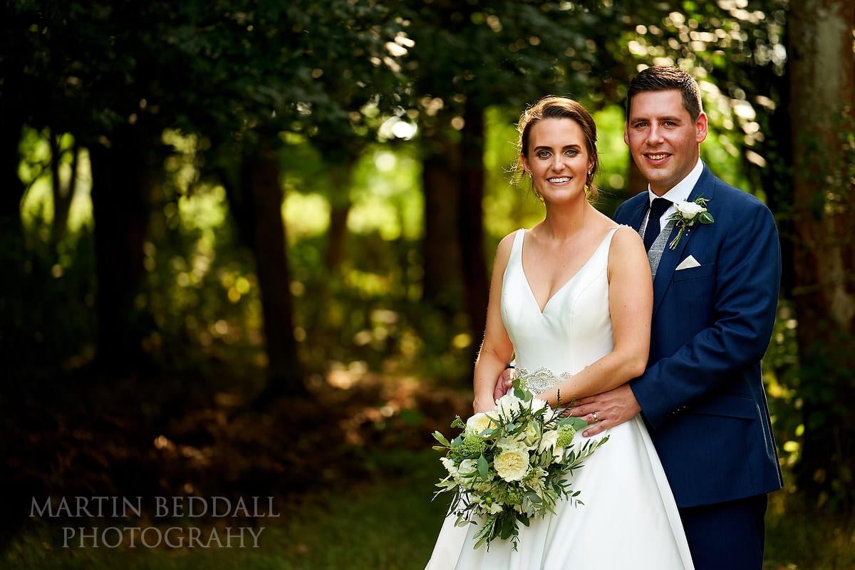 Couple portrait at Marquee in the garden wedding