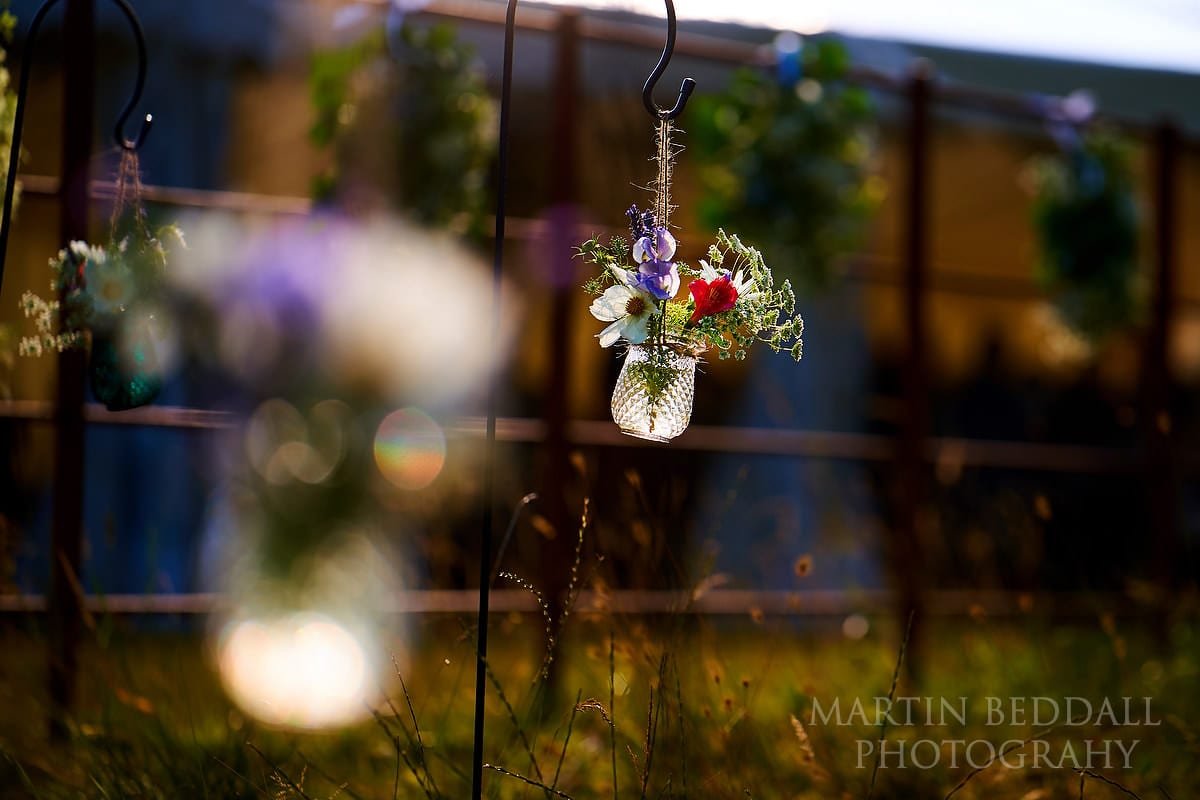 Detail in the sunshine at Marquee in the garden wedding