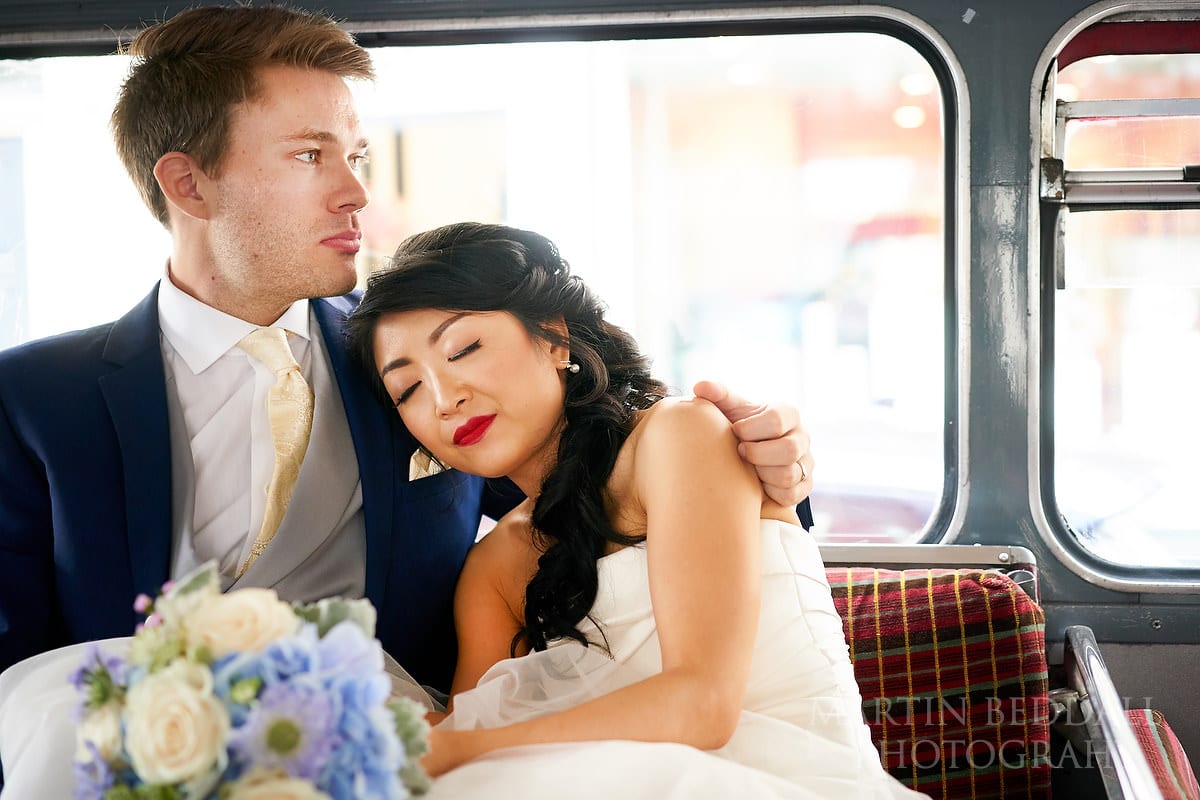 Bride and groom on the wedding bus