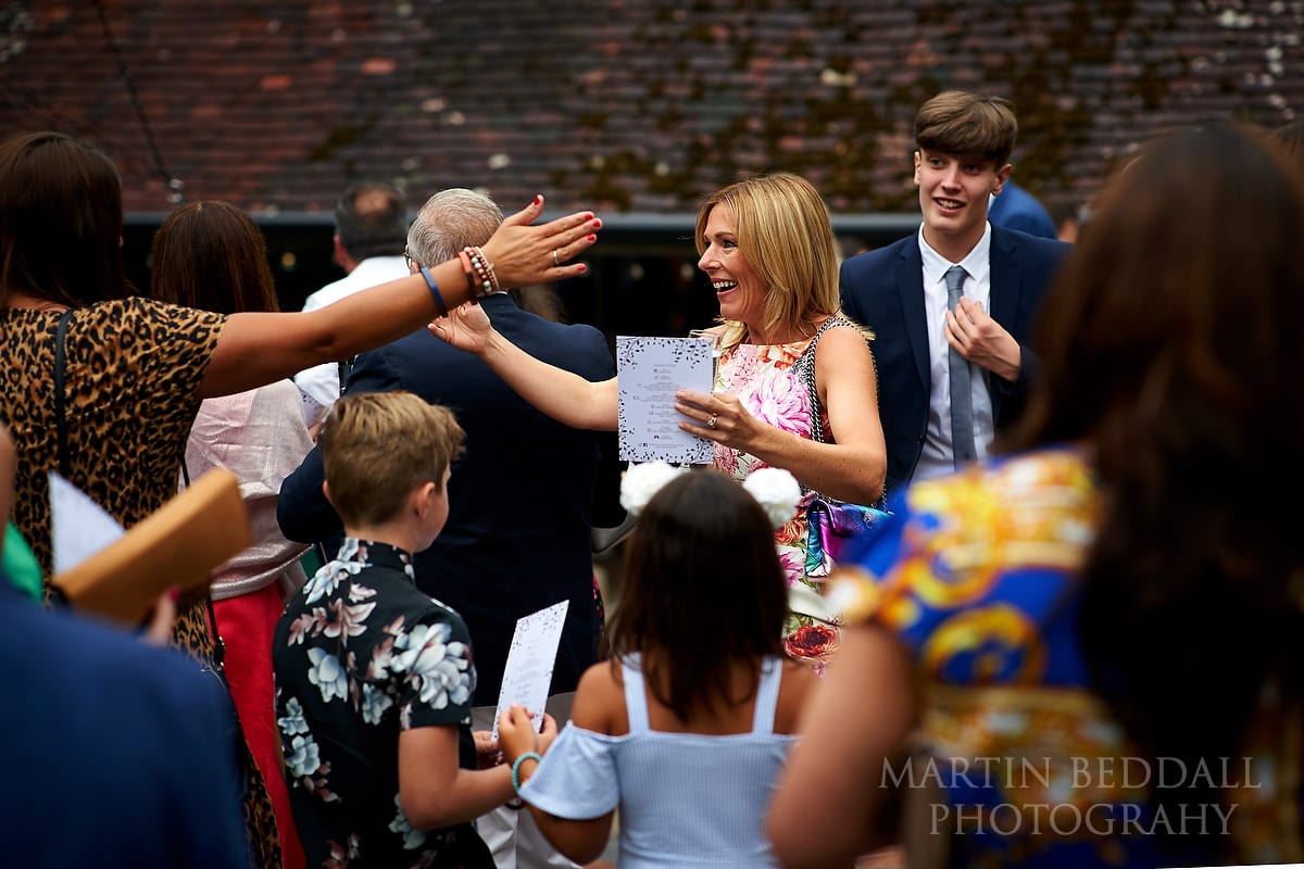 Guests greet each other