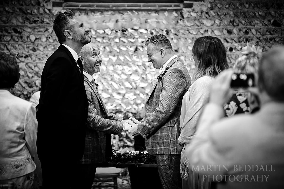 same-sex wedding ceremony at Cissbury Barns