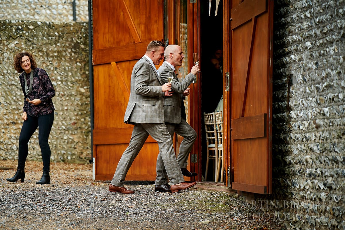 Grooms announced into the barn