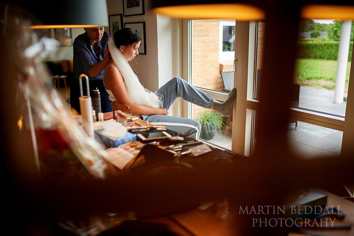 Bride getting ready at home in Denmark