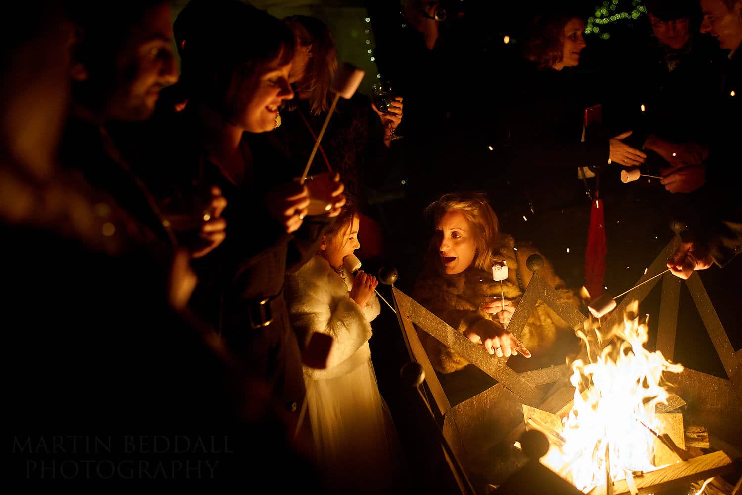 marshmallows around the fire pit