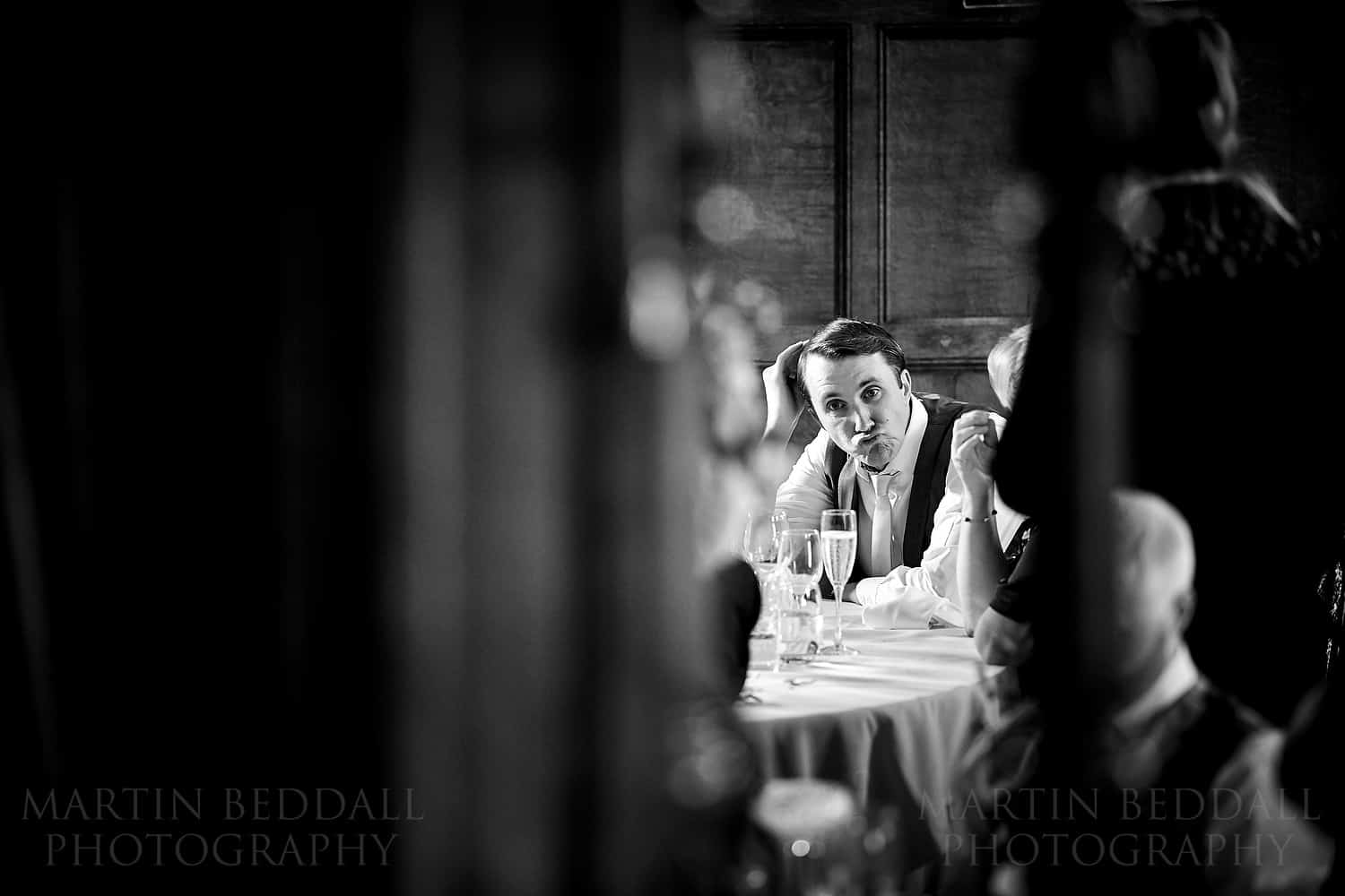 groom pulls a face