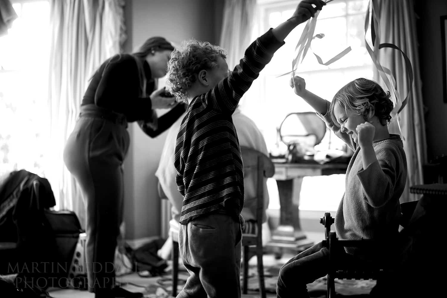 Kids playing during bridal prep