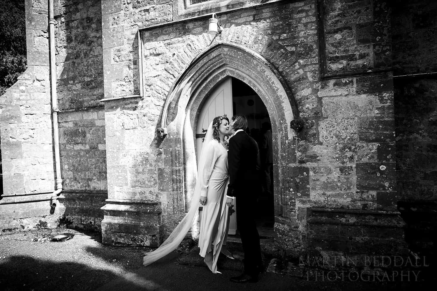 Kiss outside the church