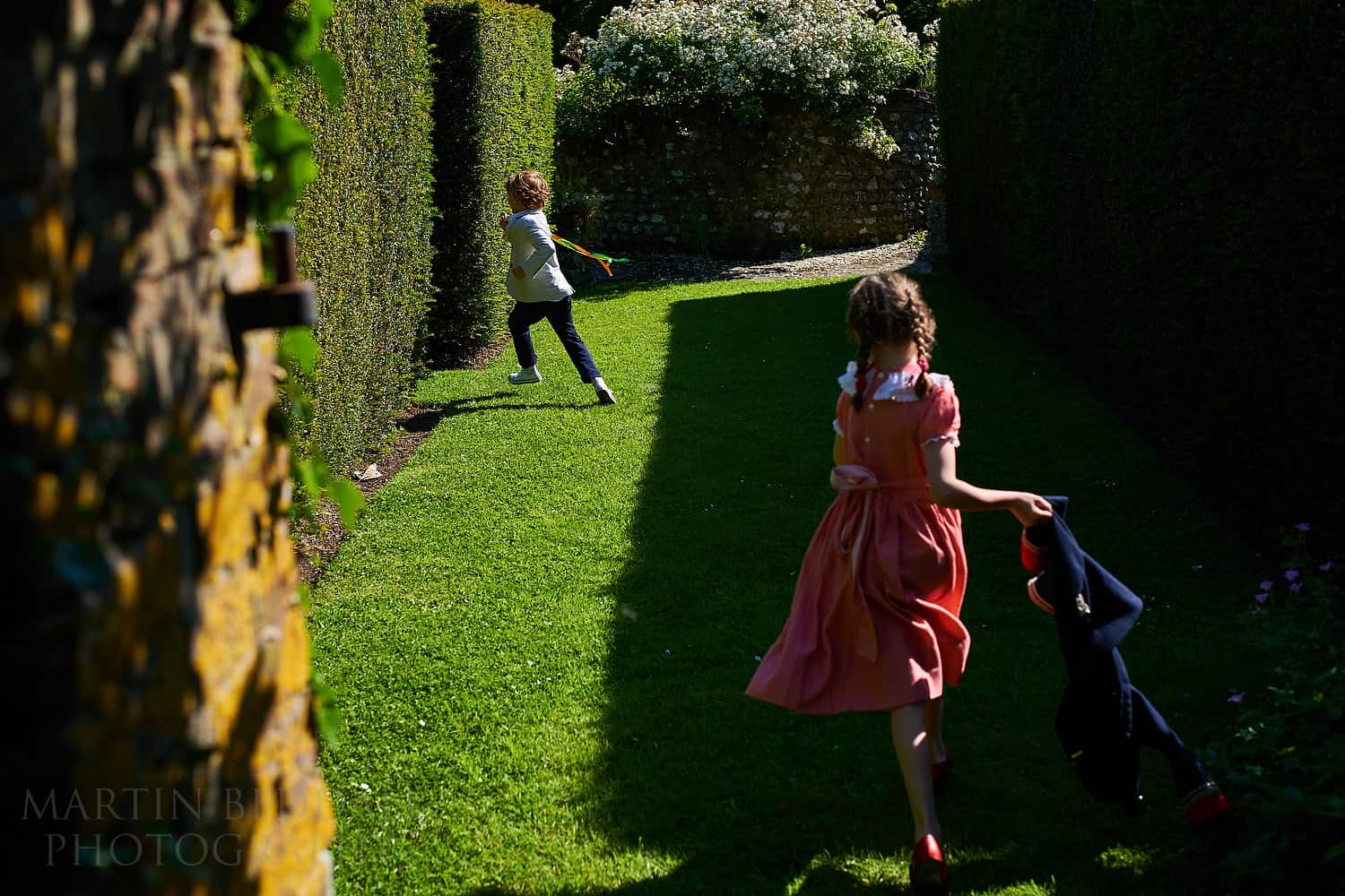 Kids playing in the grounds of Plush Manor