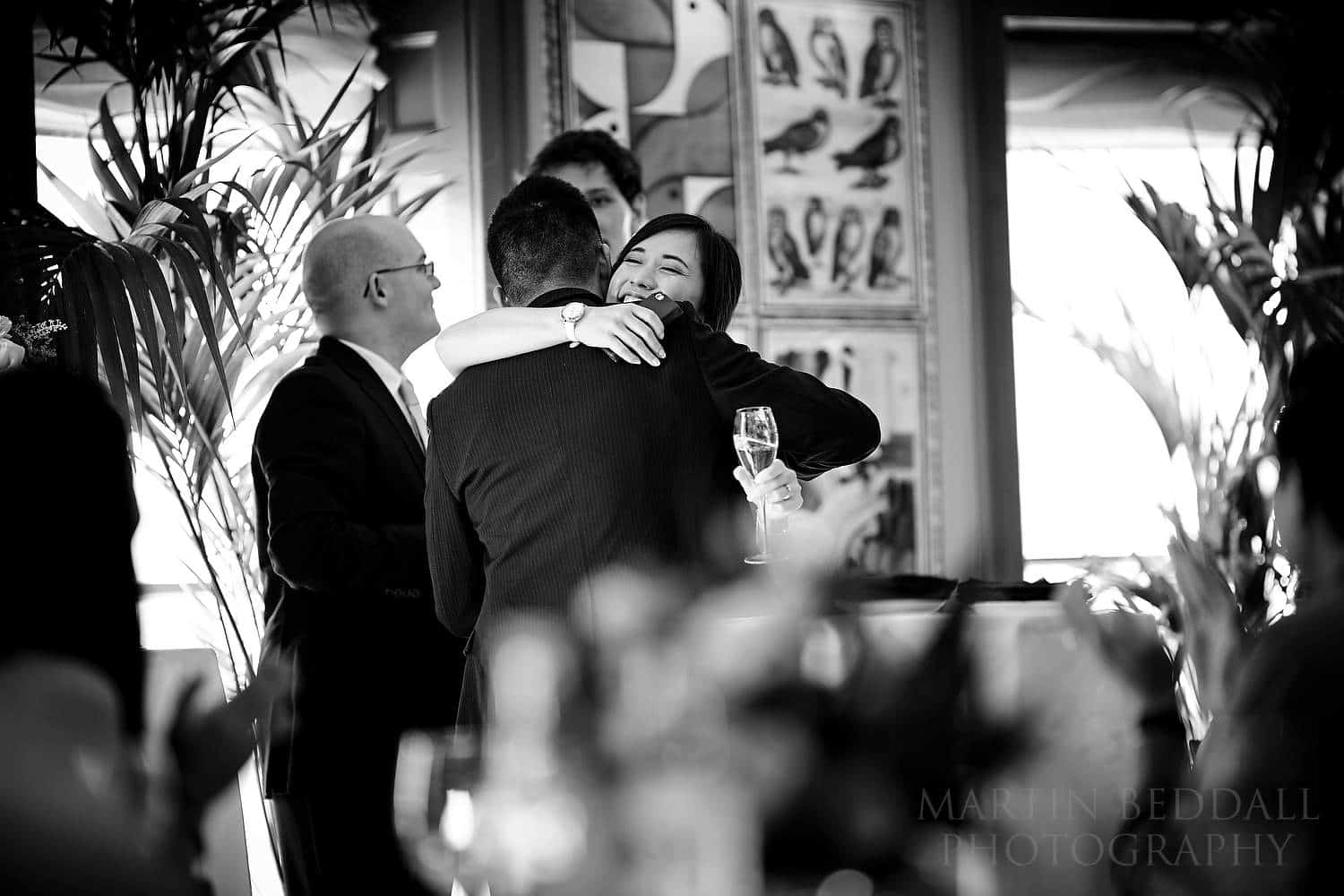 Bride hugs her brother after his speech
