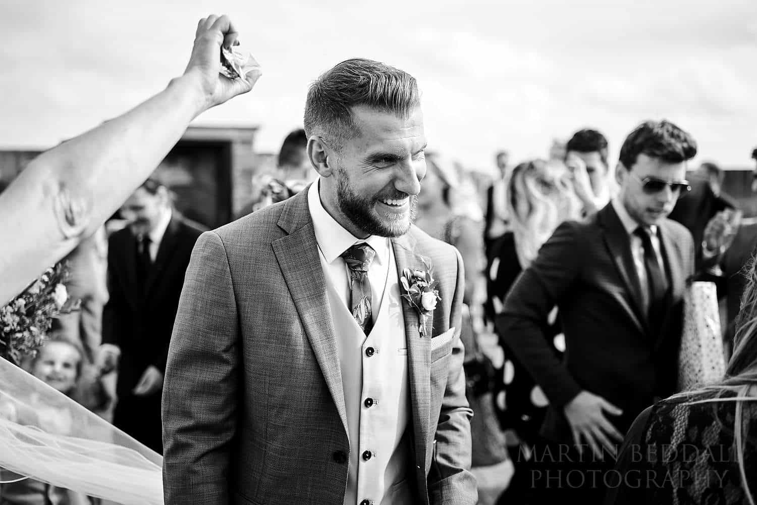 Confetti on the groom