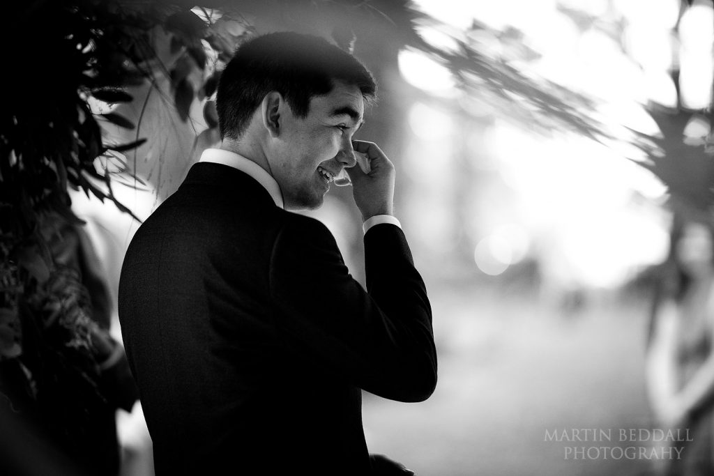 Tearful groom waits for the ceremony to start at Two Woods Estate