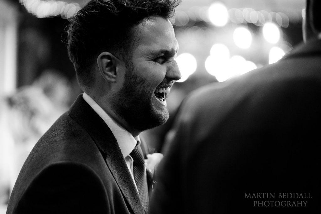 Laughing groom