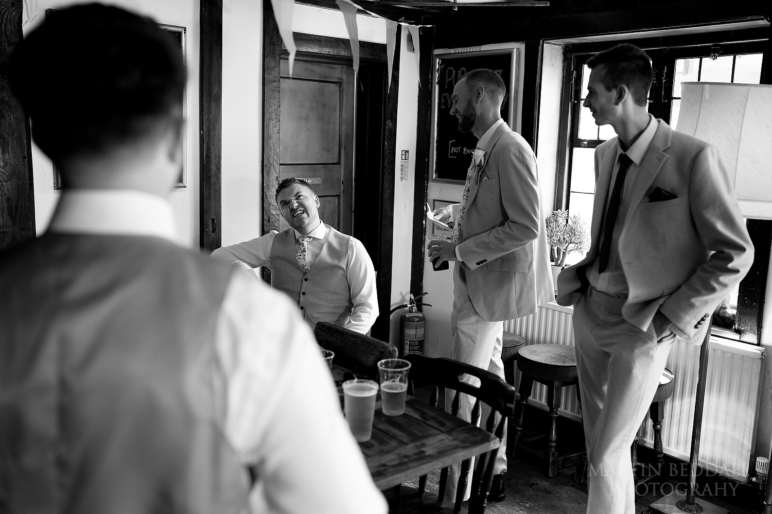 Groom and his groomsmen in the village pub