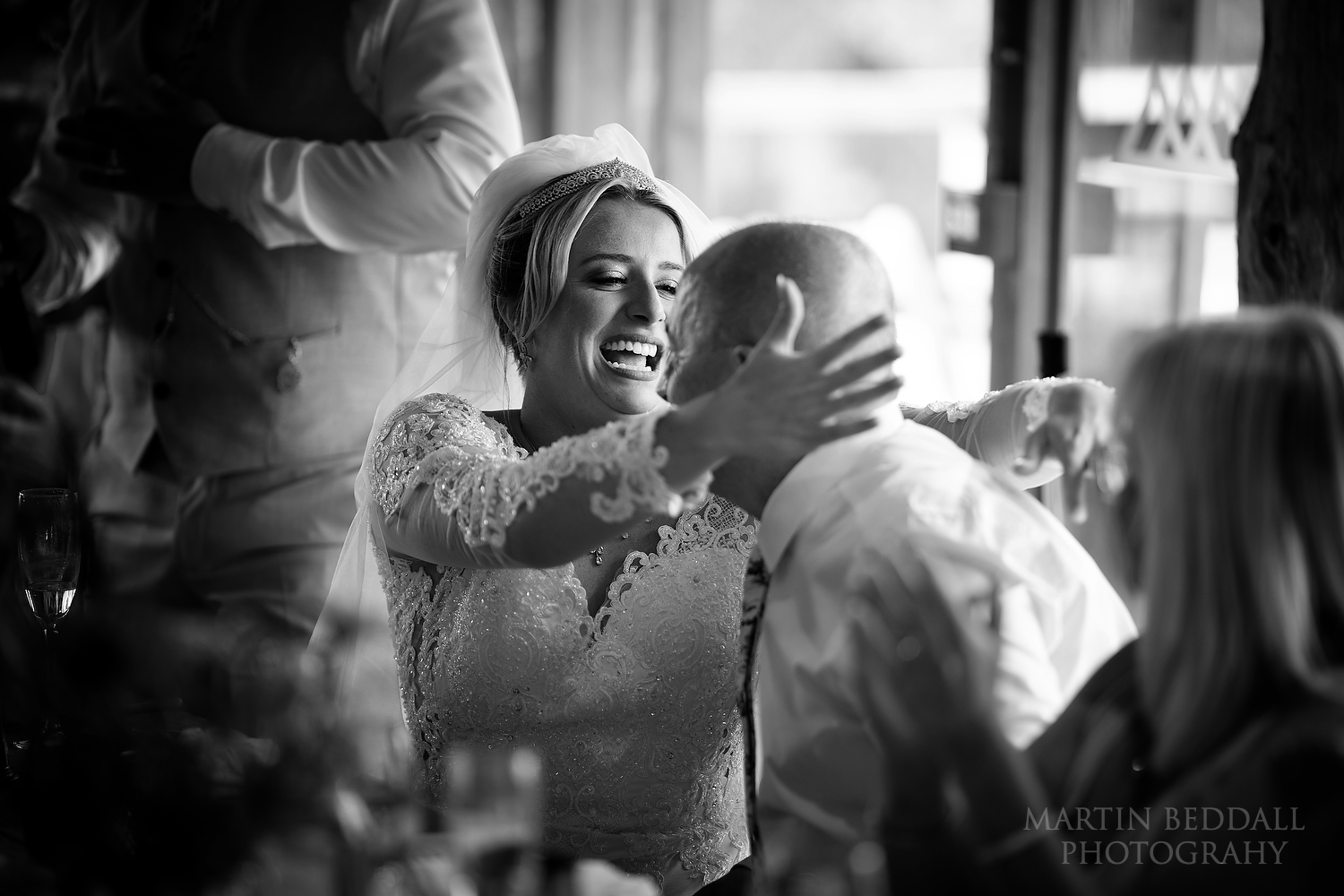 Bride hugs her father after his speech