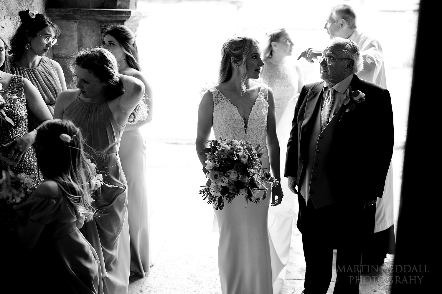 Bride and her father about to enter Corfe church