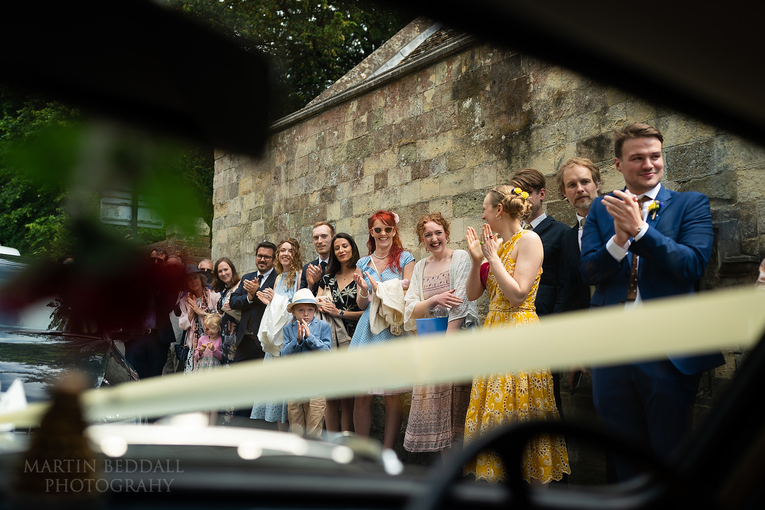 Guest see off the bride and groom from Lewes Registry office