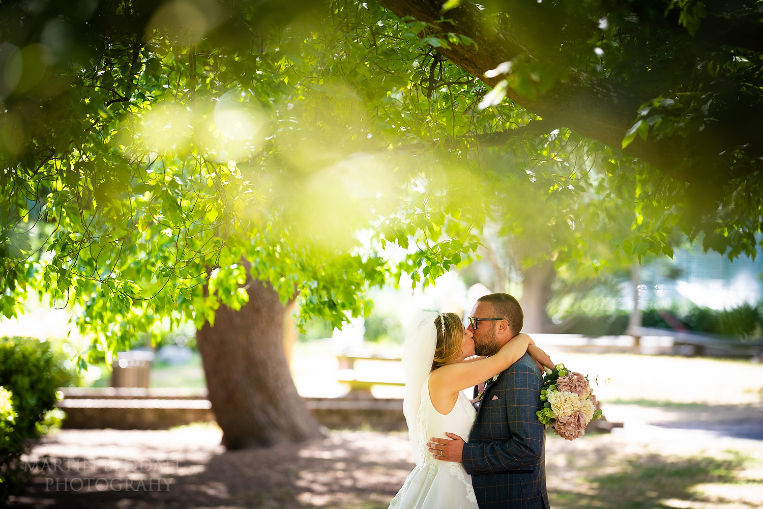 Portrait kiss in the grounds of the Tudor Barn