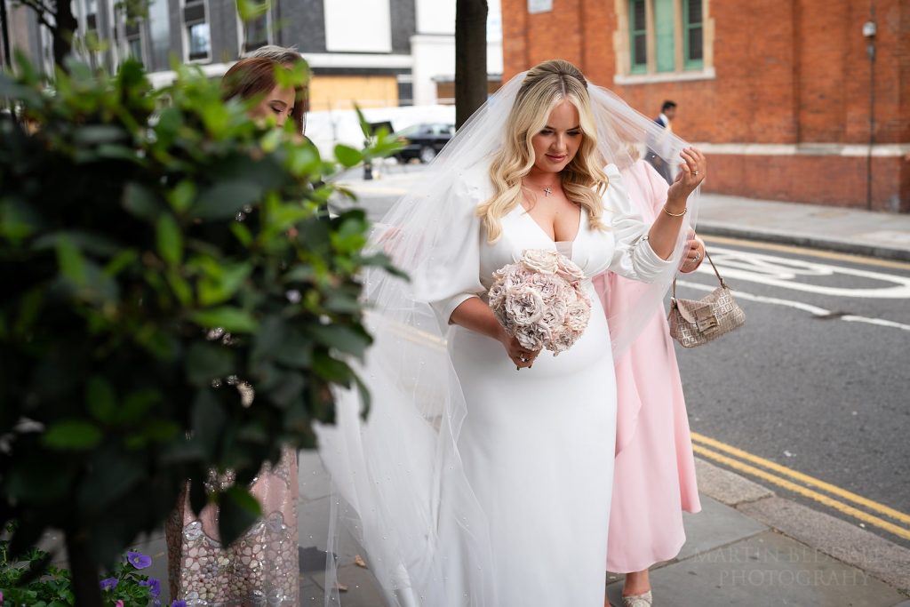 Bride prepares to enter Chelsea Town Hall