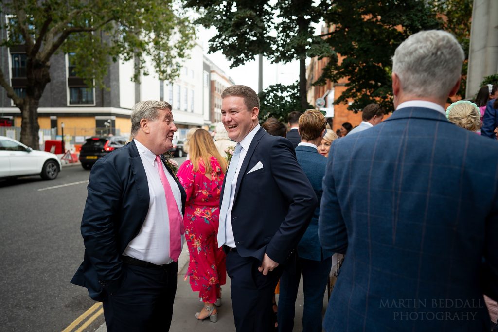 Groom and his father-in-law joke