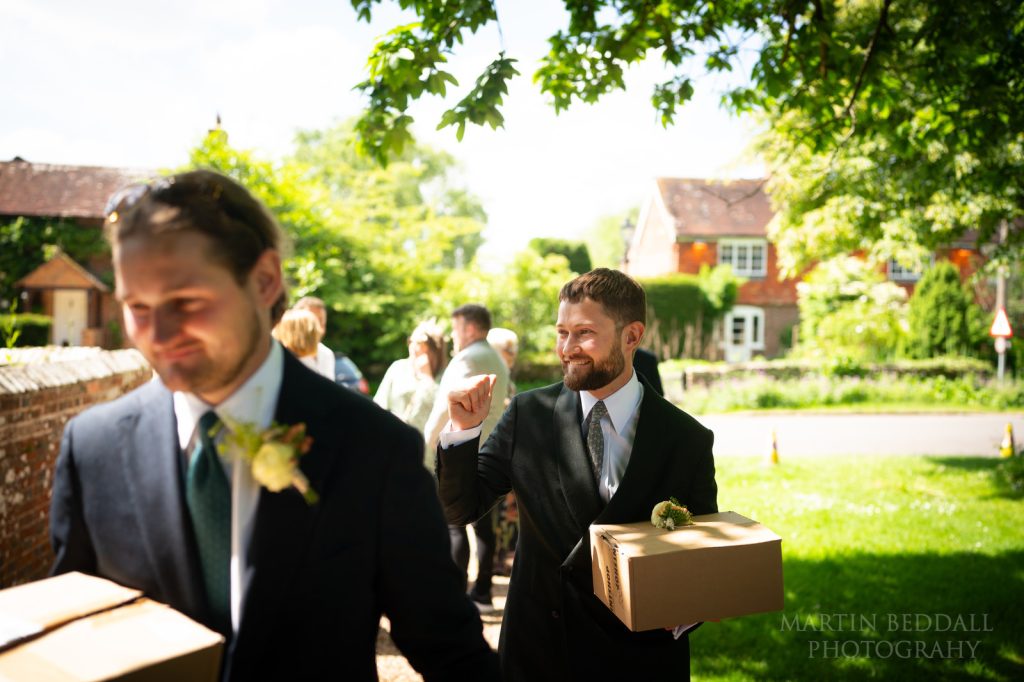 Groom arrives at the church in Kirdford