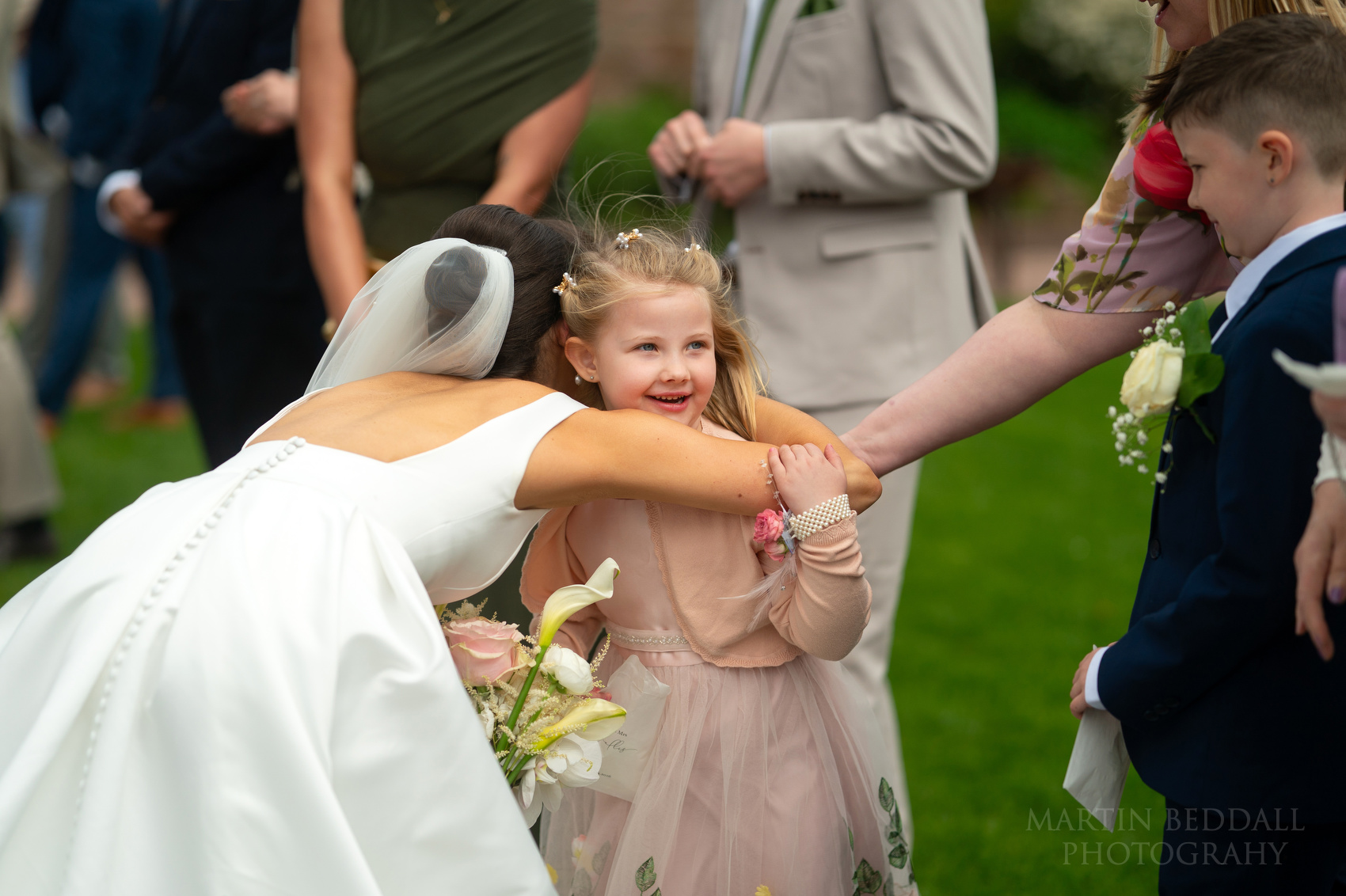 hugs for the bride