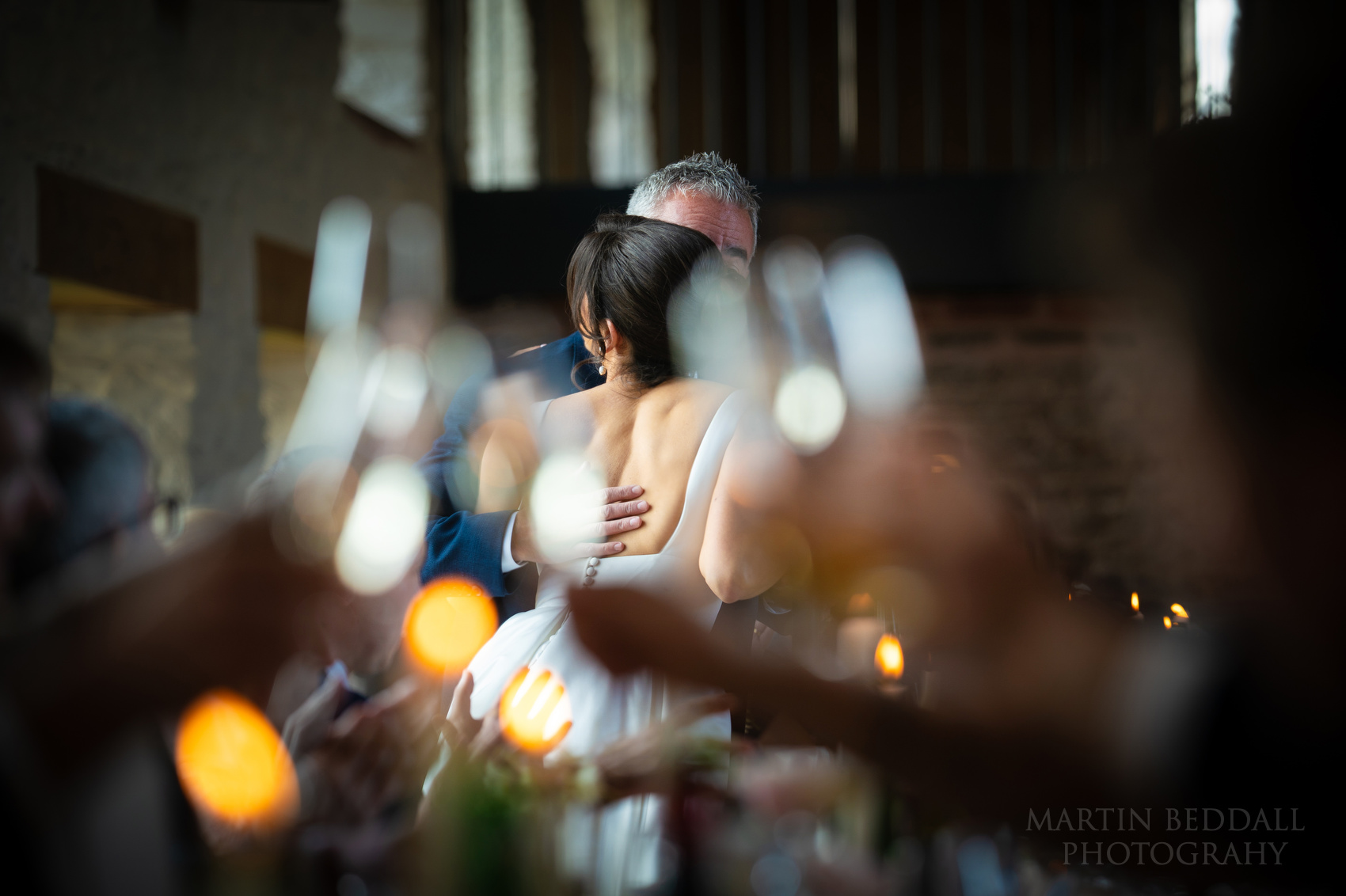 Bride hugs her father after his speech