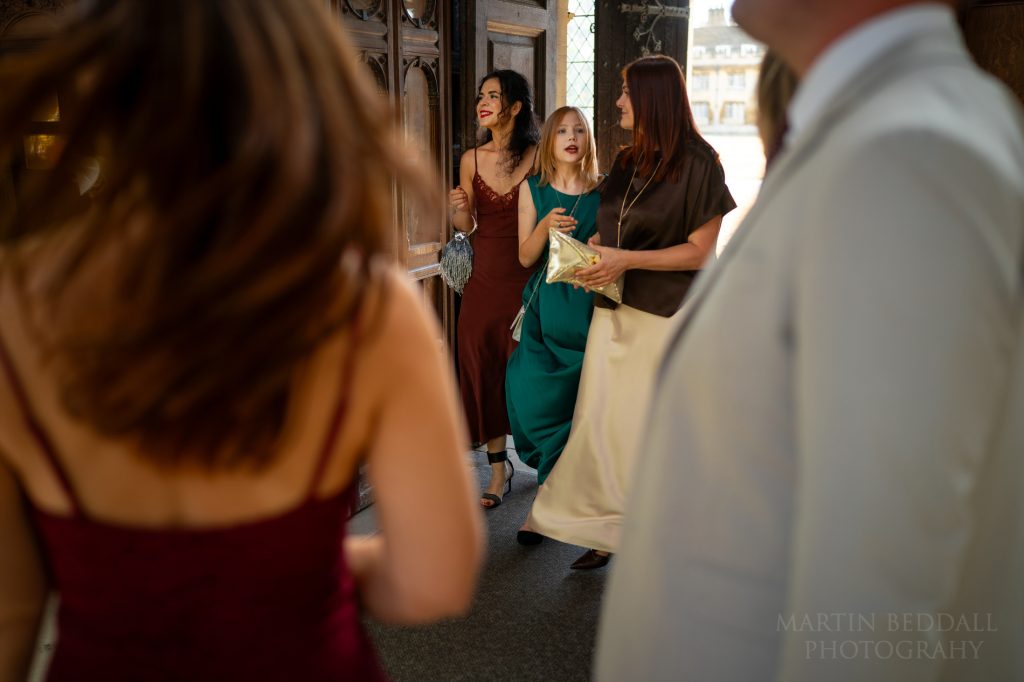 Guests arrive into Trinity College Chapel's ante-chapel